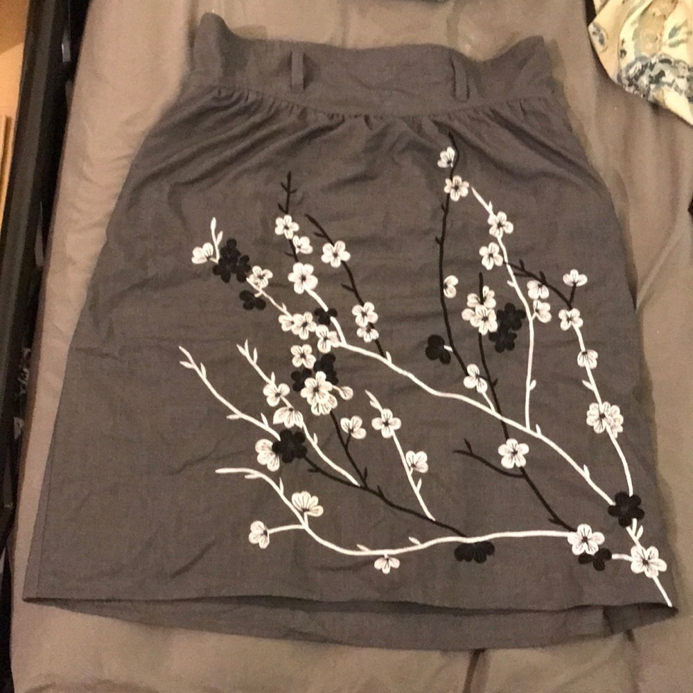 Knee length grey pencil skirt with floral pattern